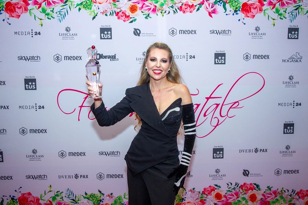 Hajdi at the Femme Fatale event backdrop